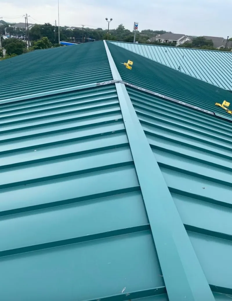 Green commercial metal roof ridge and valley for Metal Roof Repair in Weymouth Town